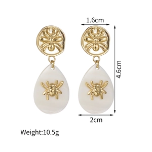 Detailed view of vintage gold spider drop earrings with dimensions and weight data