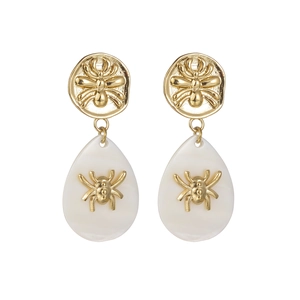 Retro gold and white spider teardrop earrings with textured circular metal studs