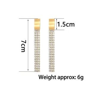 Elegant gold-tone tassel earrings with long sparkling zircon fringes and matte finish studs