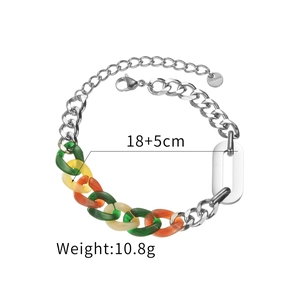 Colorful acrylic resin link and stainless steel chain bracelet for women on white background