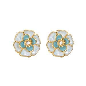 Elegant camellia stud earrings in gold alloy with blue and white enamel petals and zircon center