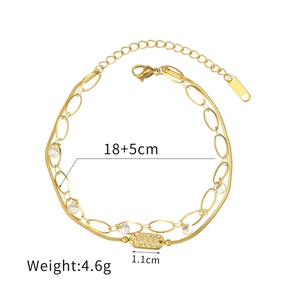 Élégant bracelet doré à double chaîne avec charms géométriques en cristal et diamants