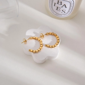 Minimalist 14K gold-plated C-shaped stud earrings featuring small geometric cube beads