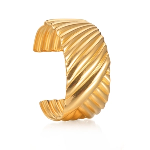 Golden wide cuff bracelet with vintage ripple texture and minimalist pleated metal design