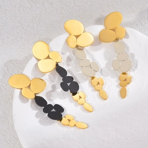Vintage oversized asymmetric tassel earrings with geometric gold and matte accents