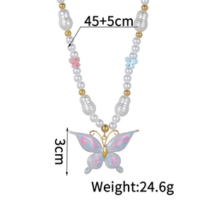 Detail view of colorful pearl butterfly necklace with 45+5cm length and 3cm pendant