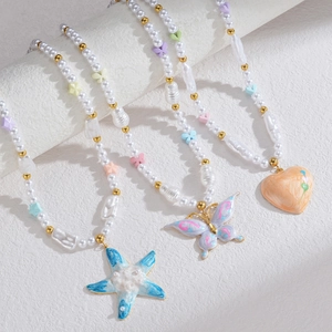Bohemian pearl necklaces with colorful butterfly, heart, and starfish pendants for women