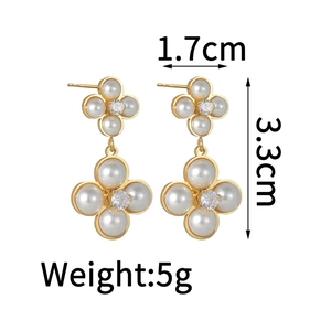 Detailed view of pearl clover drop earrings with dimensions 1.7cm and weight 5g
