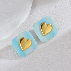 Modern light blue striped square stud earrings with central gold 3D heart detail