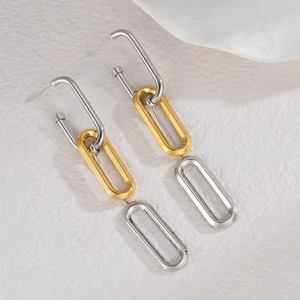 Minimalist gold and silver two-tone geometric oval hoop earrings with snake chain fringe