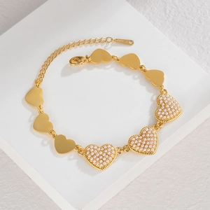 Bracelet coeur en acier inoxydable doré orné de perles élégantes et fermoir mousqueton