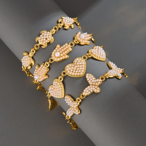 Bracelet En Acier Inoxydable Plaqué Or Avec Künstliche Perle D Imitation Papillon Coeur Tortue Main De Fatma Bijoux Elégants Pour Femmes