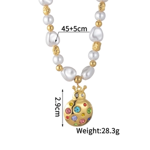 Baroque pearl necklace with ladybug pendant featuring colorful crystals and size specs