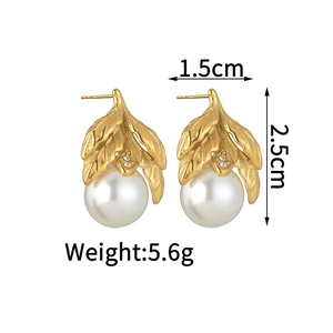 Detail shot of vintage leaf pearl earrings with crystal accents and 2.5cm size markers