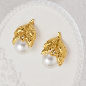 French vintage gold leaf stud earrings with lustrous pearls and sparkling rhinestones