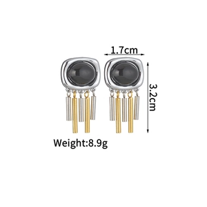 Detail view of vintage geometric tassel earrings with dimensions and weight specs