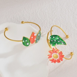 Pastel enamel flower and leaf open bangle with white pearls in gold plated finish