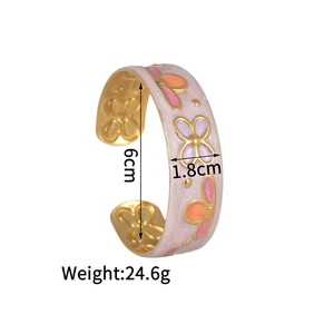 Detail view of colorful floral enamel bangle showing 6cm diameter and 1.8cm width specs