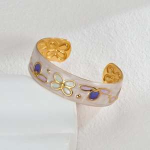 Vintage gold-plated cuff bracelet with marble enamel and purple floral patterns