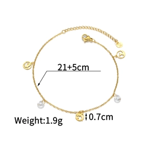 Detail of 18k gold plated anklet showing dolphin and seahorse charms with 21+5cm size info