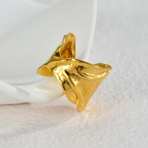 Minimalist gold open ring with irregular organic texture and twisted molten metal design