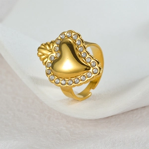 Adjustable gold stainless steel ring with a rhinestone-studded heart centerpiece