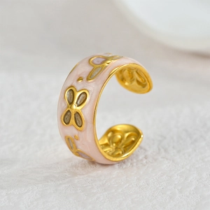 Adjustable gold stainless steel ring with pink enamel and butterfly patterns