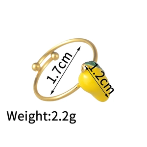 Detail of adjustable gold mango ring showing dimensions 1.7cm diameter and 1.2cm fruit motif