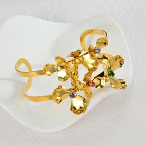 French vintage gold-plated stainless steel cuff featuring vibrant colorful floral stones