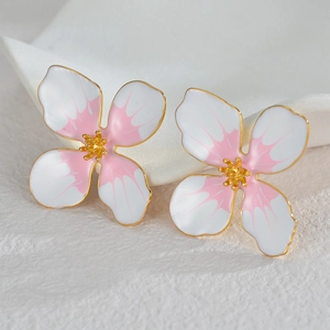Boucles d'oreilles fleurs en acier inoxydable avec émail rose et blanc et détails dorés