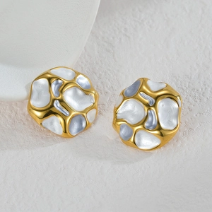 Minimalist irregular gold concave earrings with white enamel finish in artistic design