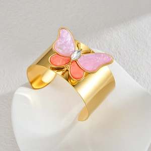 Goldenes breites Armband mit großem Perlmutt-Schmetterling und Kristallstein