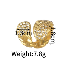 Detail showing irregular gold ring texture with zircons, width 1.3cm and weight 7.8g