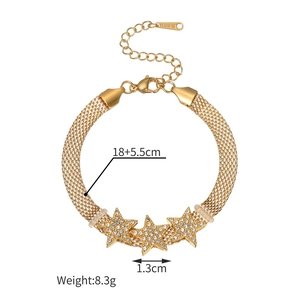 Detail of gold mesh chain bracelet with three pavé rhinestone stars and 18+5.5cm sizing