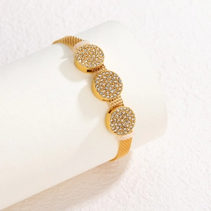 Elegant gold mesh bracelet for women with three round charms paved in sparkling rhinestones
