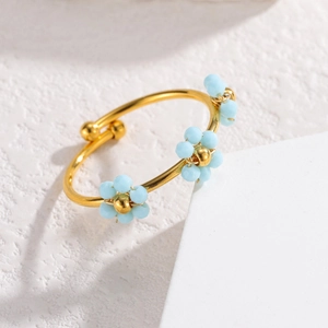 Bracelet ajustable en acier inoxydable doré 18 carats avec fleurs en perles bleues