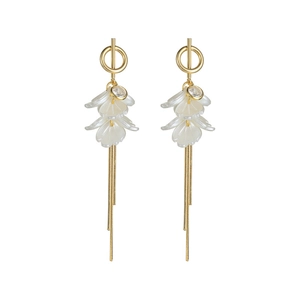 Long gold tassel earrings with white flower petals and zircon stones for women