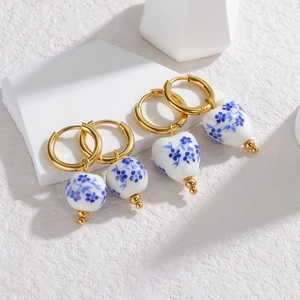 Blue and white porcelain heart and ball drop earrings with elegant golden hoops
