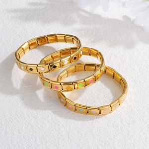 Lot de trois bracelets italiens en acier inoxydable doré avec émail coloré et design élastique