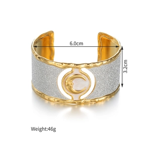 Detail of vintage sun flower cuff bracelet showing moon face charm and dimensions