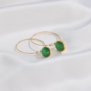 14K gold-plated hoop earrings with small white pearls and green relief pendants on silk