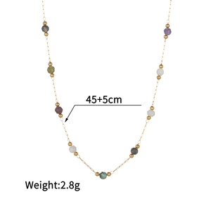 Detail of beaded gold chain necklace with colorful stones and 45cm length marking