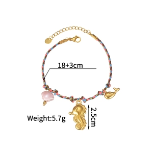 Detail of nautical braided bracelet with seahorse and whale charms and dimensions