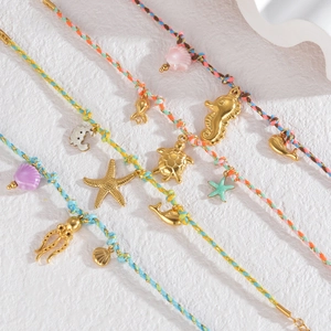 Set of 5 handmade braided nautical ocean bracelets with gold sea creature charms