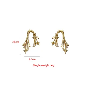 Zircon-set thorn star earrings in 18k gold plating with 3.6cm by 2.6cm dimensions