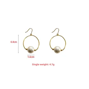 Detail showing 4.4cm drop pearl earrings with 1.6cm diameter and weight of 4.7g