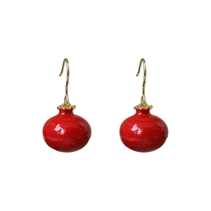 Elegant vintage pomegranate red earrings with glossy finish and gold-tone hooks