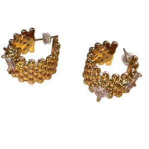 Golden C-shaped hollow earrings with glittering zircon stones and textured metal finish