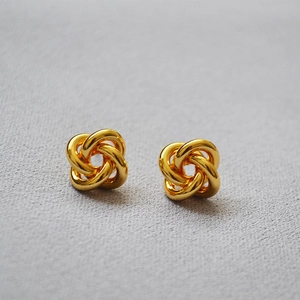 Elegant gold knot stud earrings for women with high-polish metallic finish and minimalist design