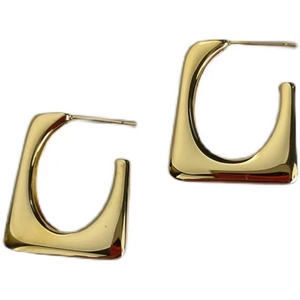 Minimalist geometric gold earrings with irregular rectangular shape and polished metallic finish